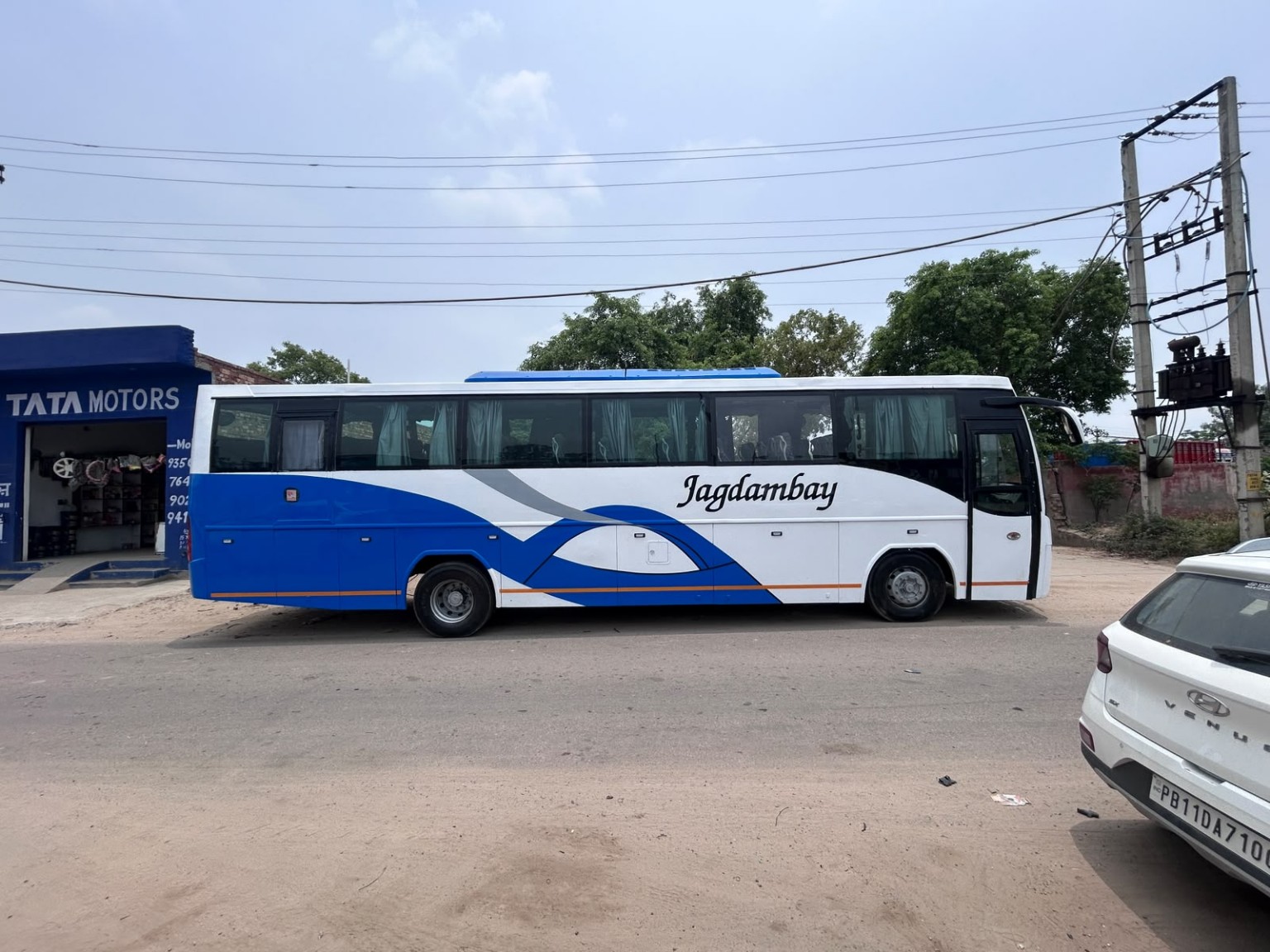 Jagdambay blue and white coach
